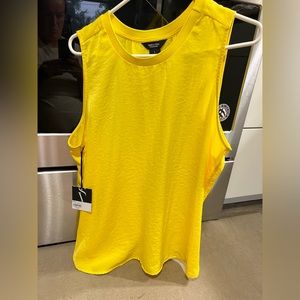 Large, Simply Vera Wang sleeveless bright, yellow, dressy shirt.